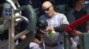 Perry Hill cools off with lettuce in his cap