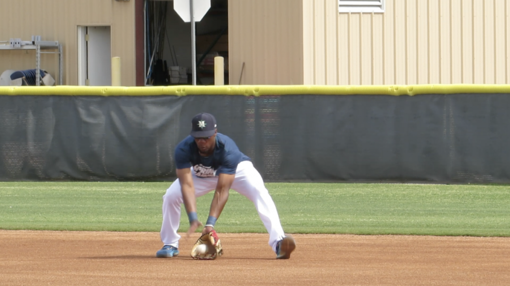 Shed Long Jr fielding ground ball at spring training